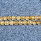 ルチルクォーツ(ルチレイテッドクォーツ)ビーズ卸売 綿ウール 6/10mm